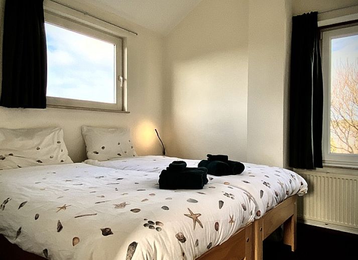 Ontspan aan het zwembad van Stappeland - Huize 100-1, een vakantiehuis in De Koog, Texel, voor een rustige vakantie.