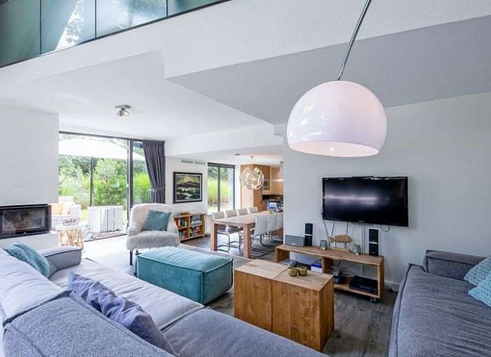 Rustige tuin bij Park Duynzoom - Villa Duynzoom in De Koog, Texel met terras en veel groen.