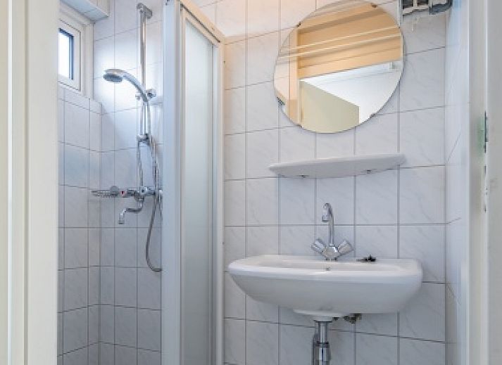 Lichte woonkamer van Motel Texel Appartement (U) in De Koog, Texel, met modern interieur en ruime zithoek voor een comfortabel verblijf.