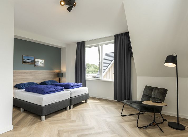 Stylish living room of Villa 39 in De Koog Texel with comfortable furniture.