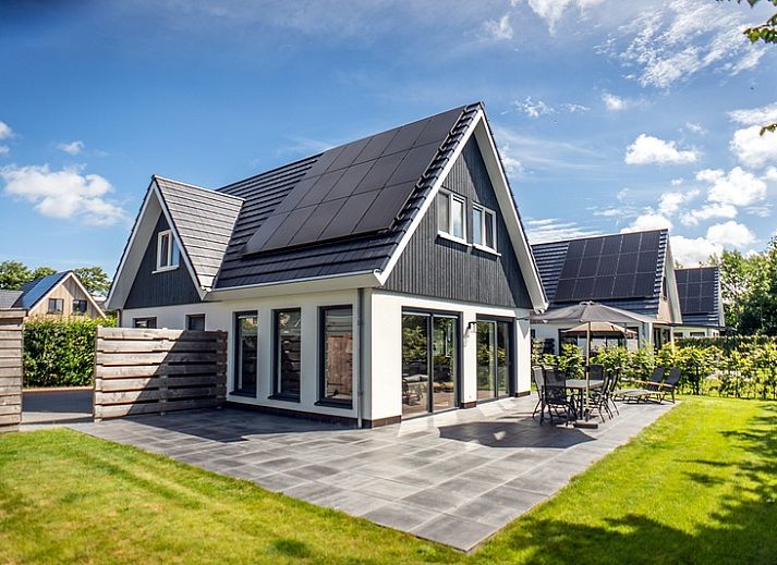 Stylish living room of Villa 39 in De Koog Texel with comfortable furniture.