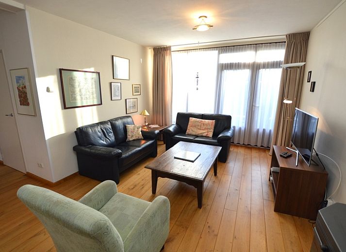 Orchismient 35 in De Koog, Texel, vakantiehuis met zonnig terras en groene tuin.