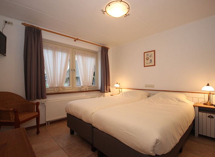 Lichte eetkamer in Villa met Serre, vakantiehuis in De Koog, Texel met ruime binnenruimte en moderne keuken.