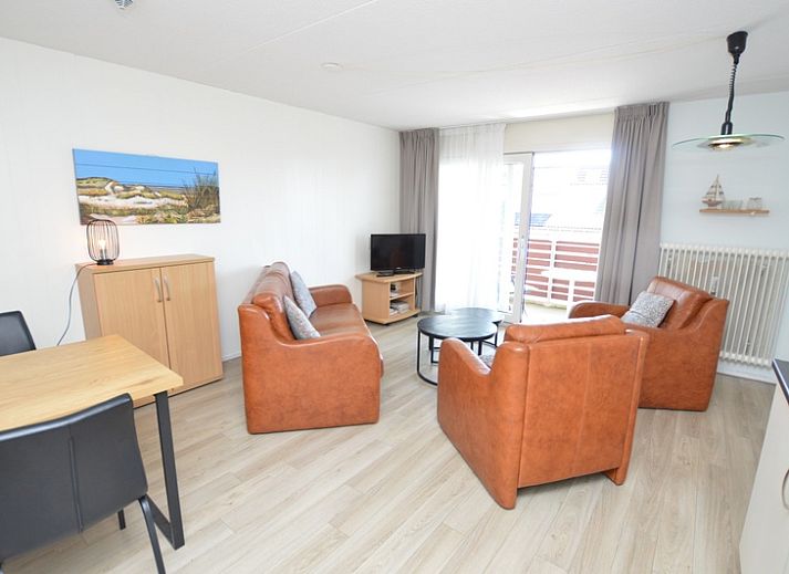Gezellige zithoek in Motel Texel - Appartement 208/1L, De Koog, Texel. Ideale plek voor ontspanning op de Waddeneilanden.