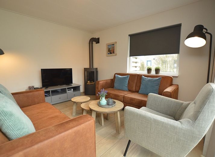 Ferienhaus Stappeland 215 in De Koog, Texel, mit grosser Terrasse und Garten, ideal fuer Entspannung auf den Watteninseln.