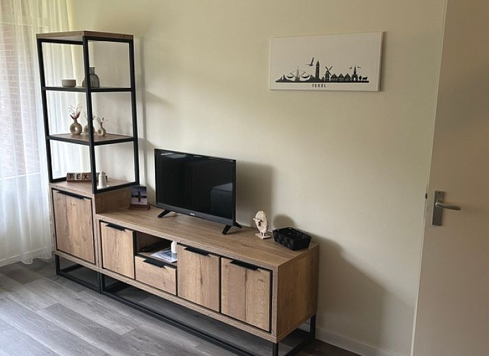 Gemuetliches Wohnzimmer im Apartment Kerckeland 40, De Koog, Texel mit Blick auf die Natur.