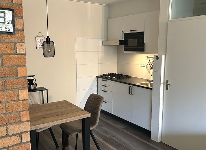 Gemuetliches Wohnzimmer im Apartment Kerckeland 40, De Koog, Texel mit Blick auf die Natur.