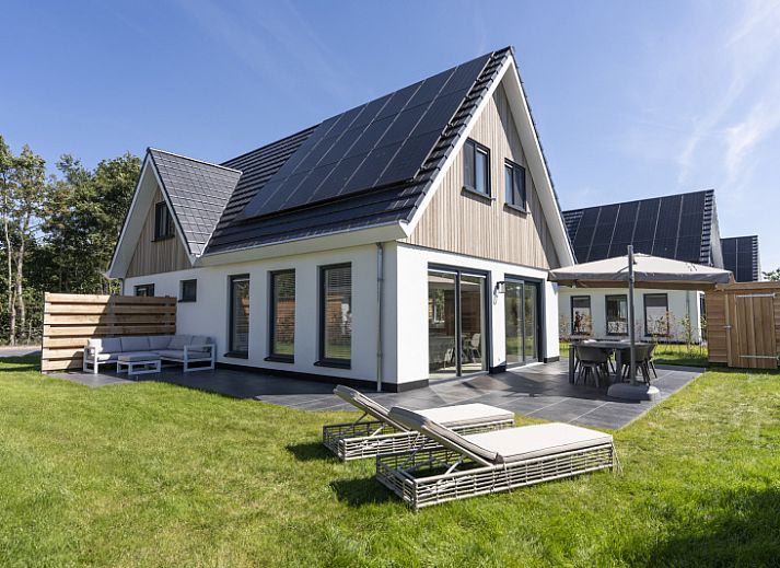 Villa 19 in De Koog on Texel, a vacation home with sunny terrace and modern outdoor space.