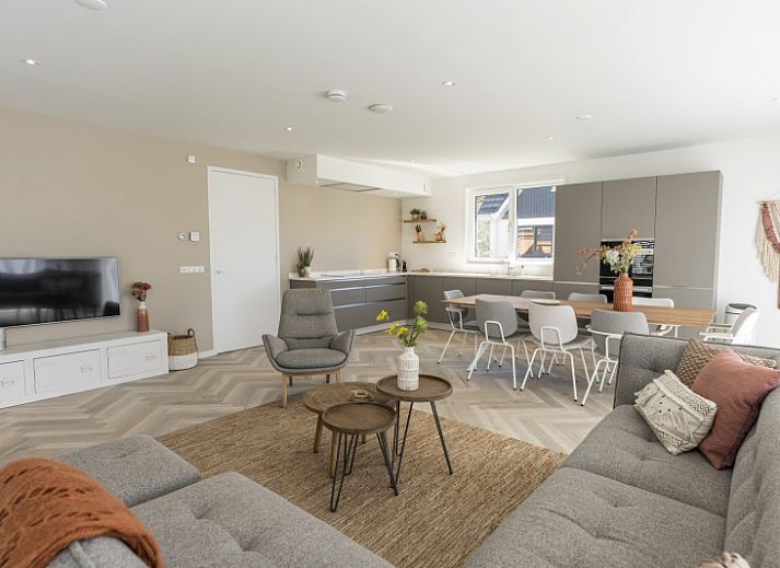 Villa 19 in De Koog on Texel, a vacation home with sunny terrace and modern outdoor space.