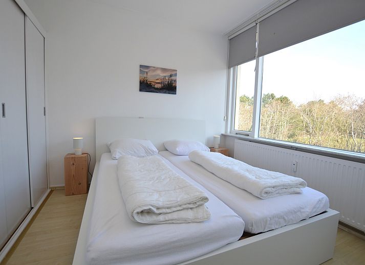 Stijlvolle woonkamer in Appartement Kerckeland 98, De Koog, Texel met open keuken en eetruimte.