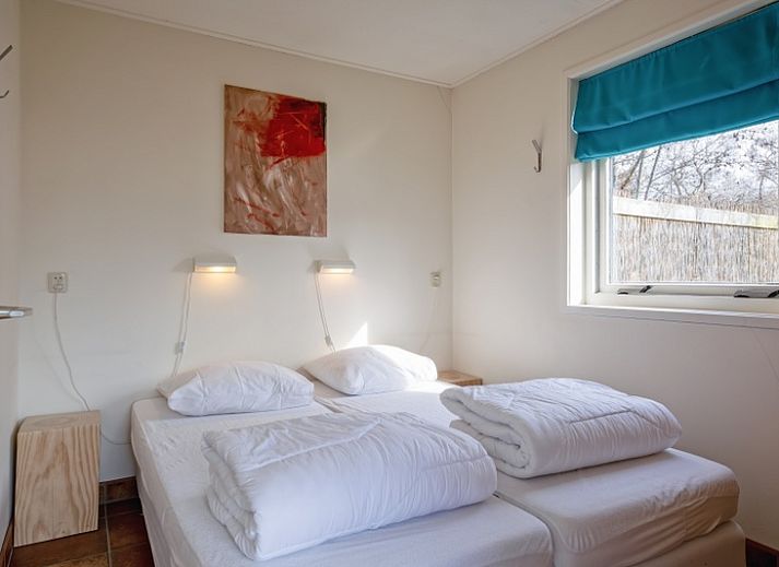 Buitenruimte van De Zonneweelde, een vakantiehuis in De Koog, Texel met uitzicht op de tuin.