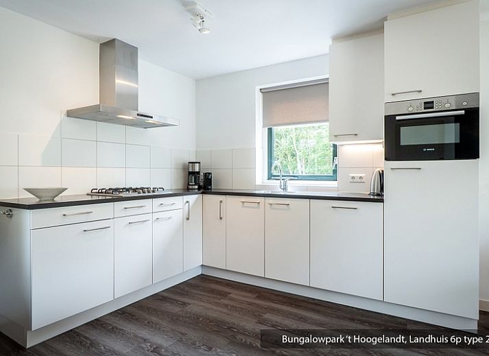 Gezellige woonkamer in Bungalowpark 't Hoogelandt vakantiehuis, De Koog, Texel met moderne inrichting.