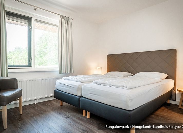 Gezellige woonkamer in Bungalowpark 't Hoogelandt vakantiehuis, De Koog, Texel met moderne inrichting.