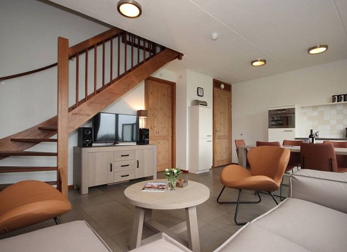 Landleven 4/5 pers. comfortabel vakantiehuis in De Koog, Texel, met uitzicht op de groene omgeving van de Waddeneilanden.