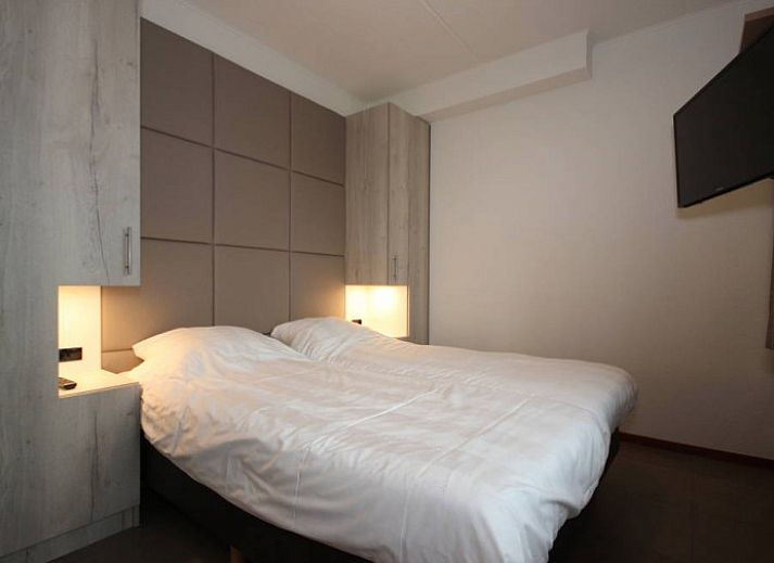 Landleven 4/5 pers. comfortabel vakantiehuis in De Koog, Texel, met uitzicht op de groene omgeving van de Waddeneilanden.