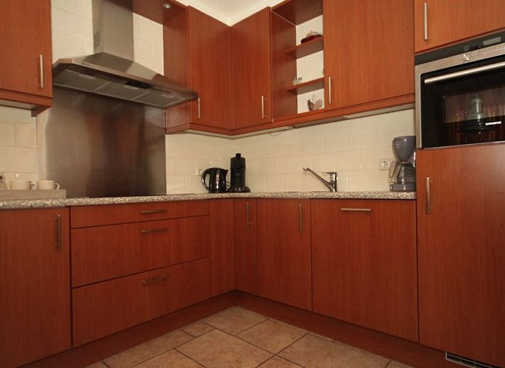 Comfortabele woonkamer van 6 Persoons luxe villa met sauna in De Koog, Texel, met moderne inrichting.