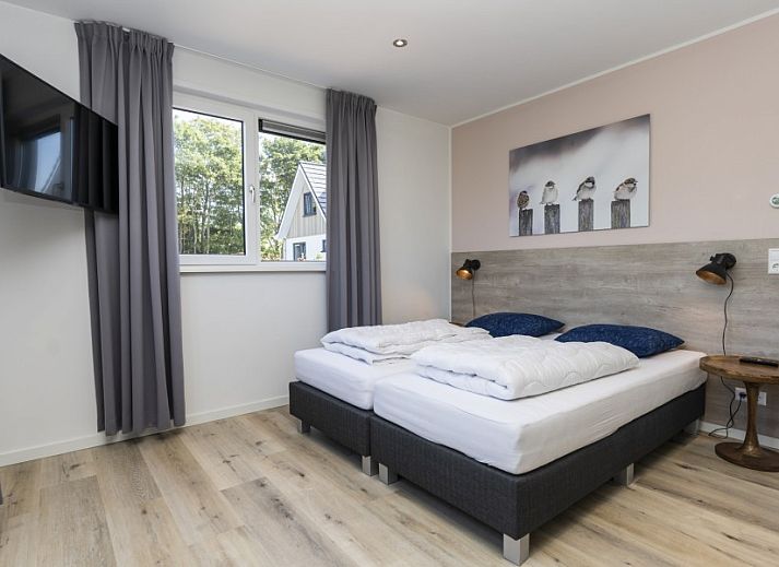 Ferienpark So What, Villa 6-Pers. in De Koog, Texel mit Trampolin im grossen Garten, ideal fuer Familienurlaub auf den Watteninseln.