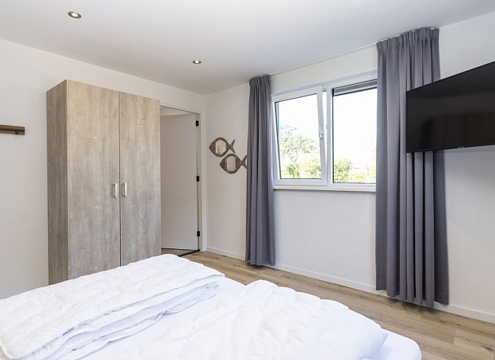 Ferienpark So What, Villa 6-Pers. in De Koog, Texel mit Trampolin im grossen Garten, ideal fuer Familienurlaub auf den Watteninseln.