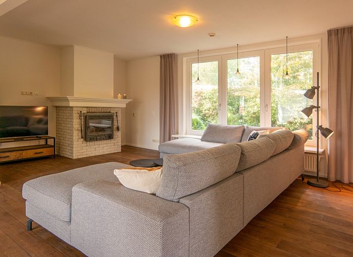 Kamerstraat 66 vacation home in De Koog Texel with spacious garden and terrace for relaxation.