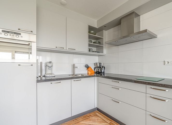 Gezellige zithoek in Appartement Juliana 146 Eiland en Zeezicht, De Koog, Texel met uitzicht op de Waddenzee.