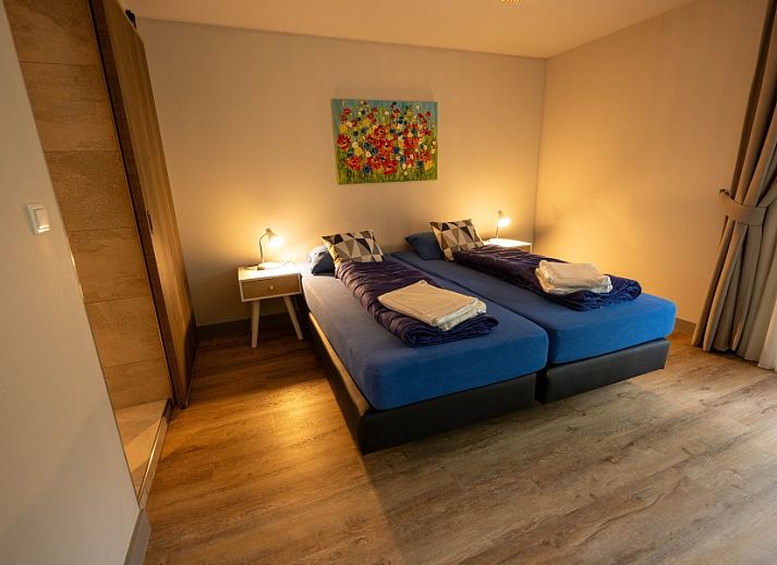 Landgoed Springtij Stulpje in De Koog Texel bietet Privatsphaere in waldreicher Umgebung und eine moderne Terrasse.