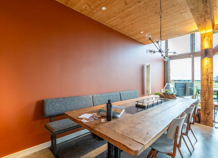 Vacation home Villa 191 with Hot tub in De Koog, Texel, offers a beautiful terrace with comfortable seating.