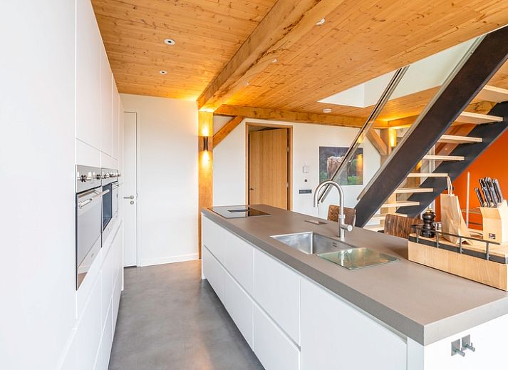 Vacation home Villa 191 with Hot tub in De Koog, Texel, offers a beautiful terrace with comfortable seating.