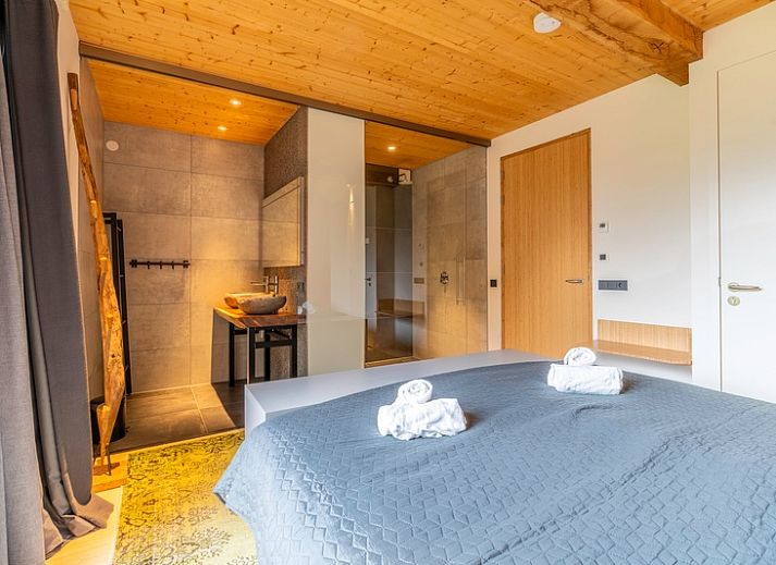 Vacation home Villa 191 with Hot tub in De Koog, Texel, offers a beautiful terrace with comfortable seating.