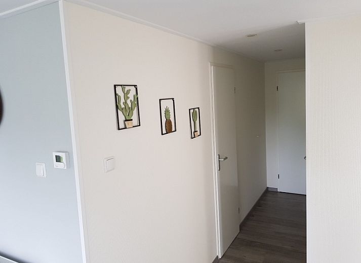 Vakantiehuis Chalet Bregkoog 208 in De Koog, Texel, met een uitnodigend terras en een rustige omgeving op de Waddeneilanden.