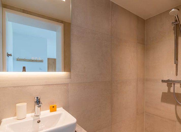 Huisje in De Koog, Texel, vakantiehuis met ruime tuin en terras met uitzicht op de Waddeneilanden.