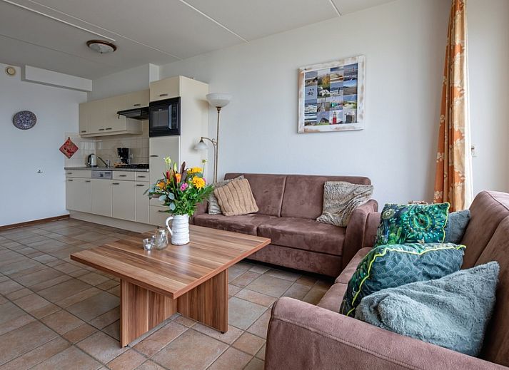 Luchtfoto van Resort De Buteriggel - Appartement 1 aan het strand van De Koog, Texel, Waddeneilanden.