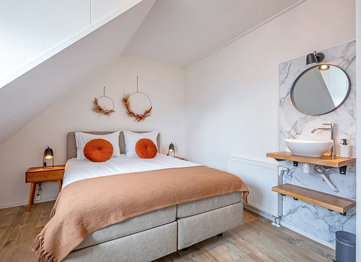 Vakantiehuis Windlust in De Koog Texel met zonnig terras en groene tuin.