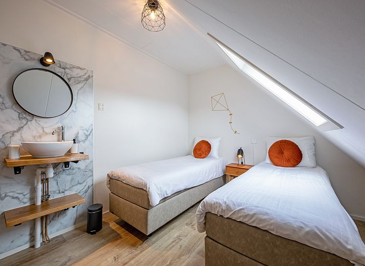 Vakantiehuis Windlust in De Koog Texel met zonnig terras en groene tuin.