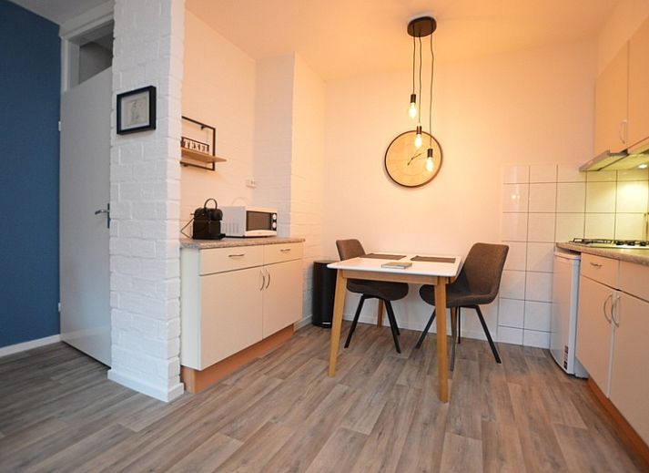 Stijlvolle zithoek van Appartement Kerckeland 26 in De Koog, Texel, met moderne decoratie.