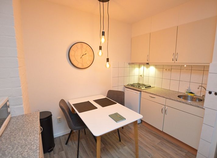 Stijlvolle zithoek van Appartement Kerckeland 26 in De Koog, Texel, met moderne decoratie.