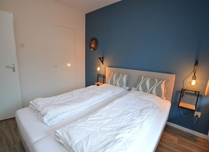 Appartement Kerckeland 26 in De Koog, Texel, met uitnodigende woonkamer en uitzicht op de natuur.