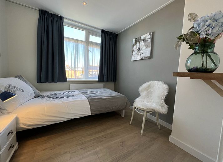 Moderne binnenruimte van Vakantiehuis Duinzee Texel in De Koog, ideaal voor ontspanning en gezelligheid.