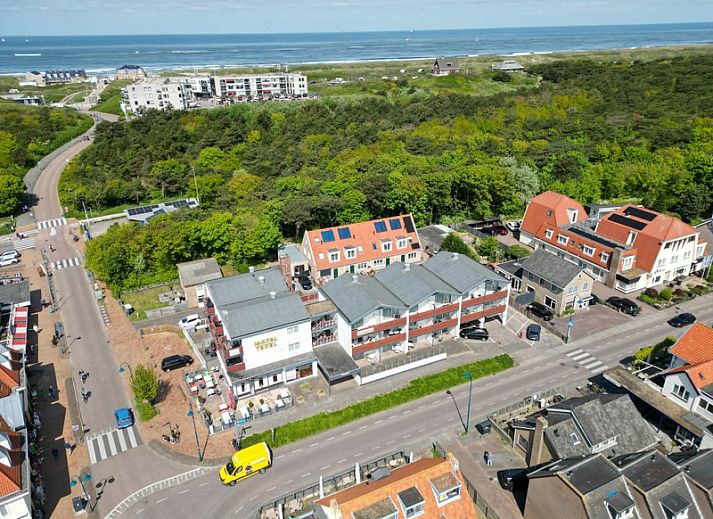 Moderne Kueche und Essbereich im Motel Texel Apartment in De Koog, Texel fuer ein wunderbares Urlaubserlebnis.