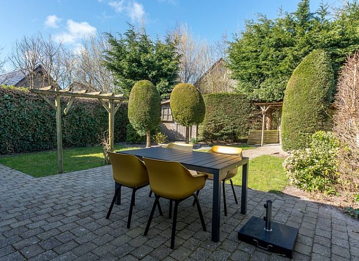 Charmant vakantiehuisje in De Koog met groene tuin op Texel, Waddeneilanden.