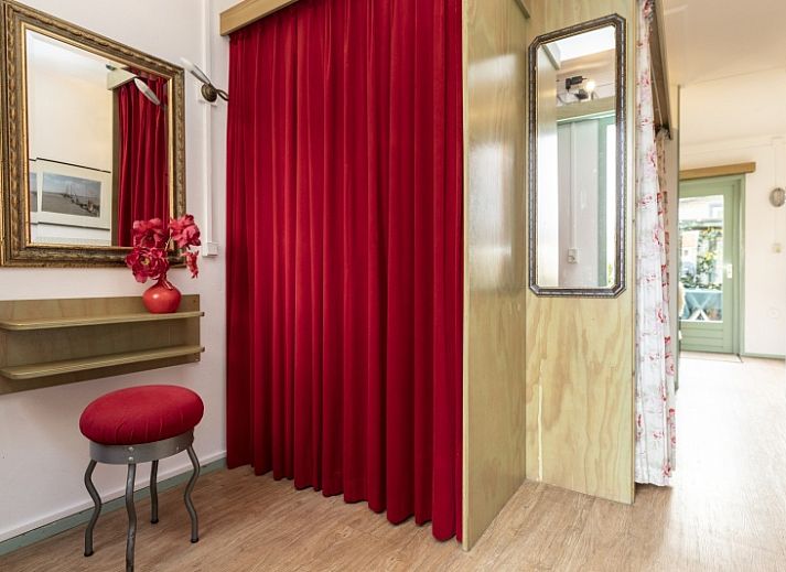 Gezellige woonkamer van Schanulleke, vakantiehuis in De Koog, Texel met comfortabele zitruimte en eethoek.