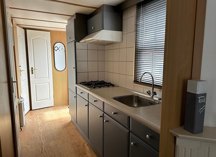 Chaletpark Bregkoog - Chalet Bregkoog 53 in De Koog, Texel met ruime buitenruimte en zonnig terras.