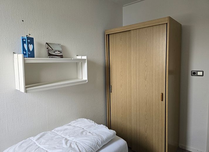 Uitzicht vanaf Appartementen Anna - Appartement 15 op de schilderachtige daken van De Koog, Texel.