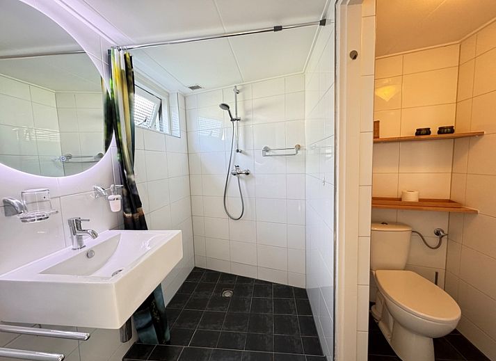 Gezellige tuin met zithoek bij vakantiehuis Texel D in De Koog, Texel, Waddeneilanden.