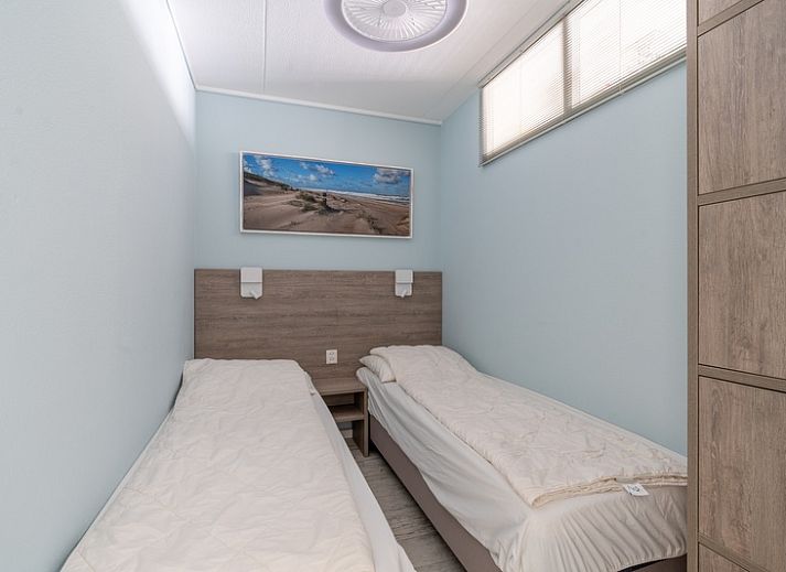 Stilvolle Sitzecke im Apartment Juliana 148 Island and Sea View, De Koog, Texel mit Blick auf die Watteninseln.