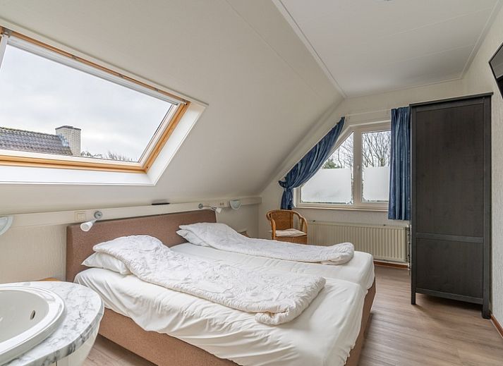 Gezellig terras van Vakantiehuis Kamperfoelie 43 met sauna in De Koog, Texel, ideaal voor ontspanning.