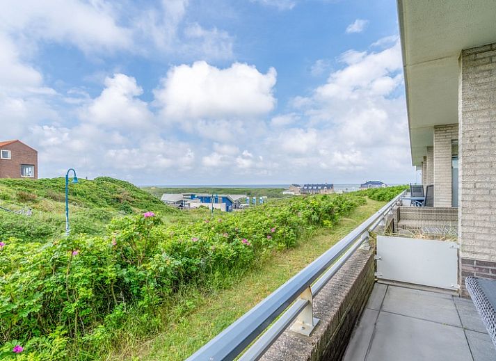 Gezellige zithoek in Appartement Juliana 042 Eiland en Zeezicht, De Koog, Texel met uitzicht op de natuur.