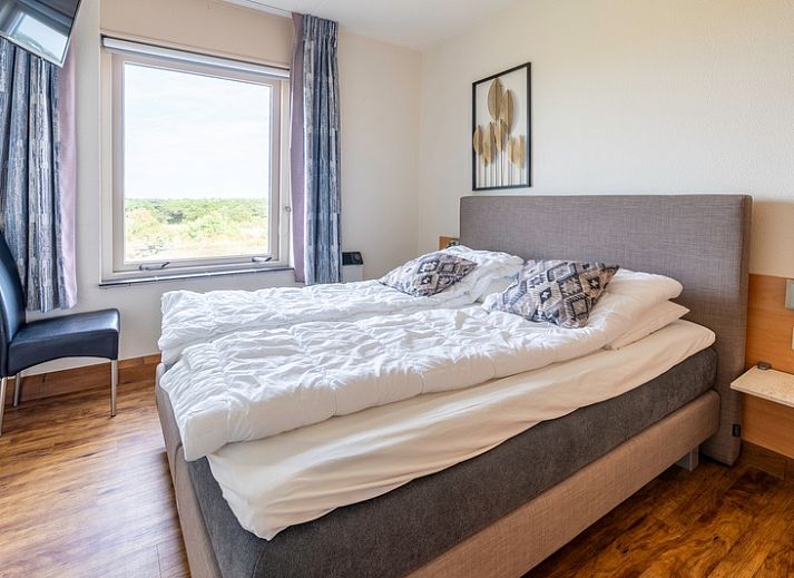 Lichte zithoek in Appartement Juliana 168 Zeezicht, De Koog, Texel, met prachtig uitzicht op de zee en de omgeving.