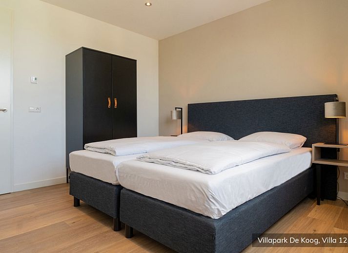 Stijlvolle woonkamer in Luxe familievilla 12p, De Koog, Texel met comfortabele zitruimte en moderne inrichting.