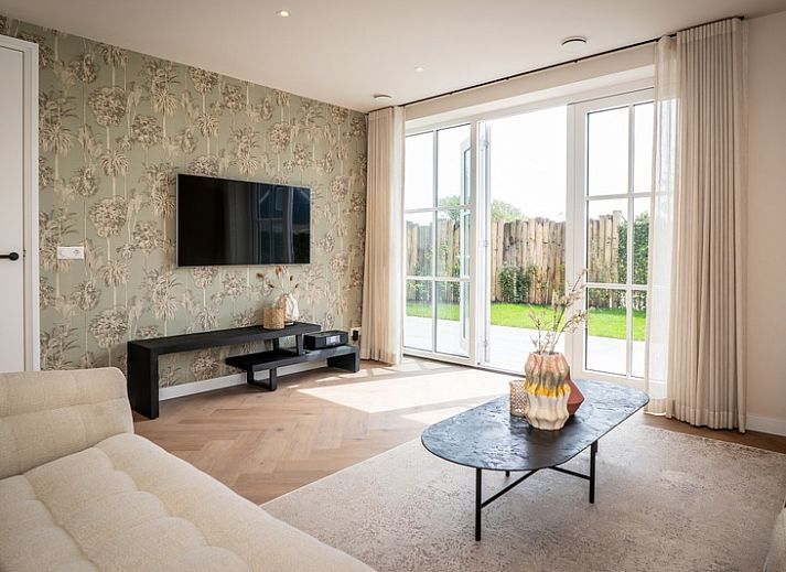 Vakantiehuis Villa 25a, De Koog, Texel met terras en groene omgeving op de Waddeneilanden.