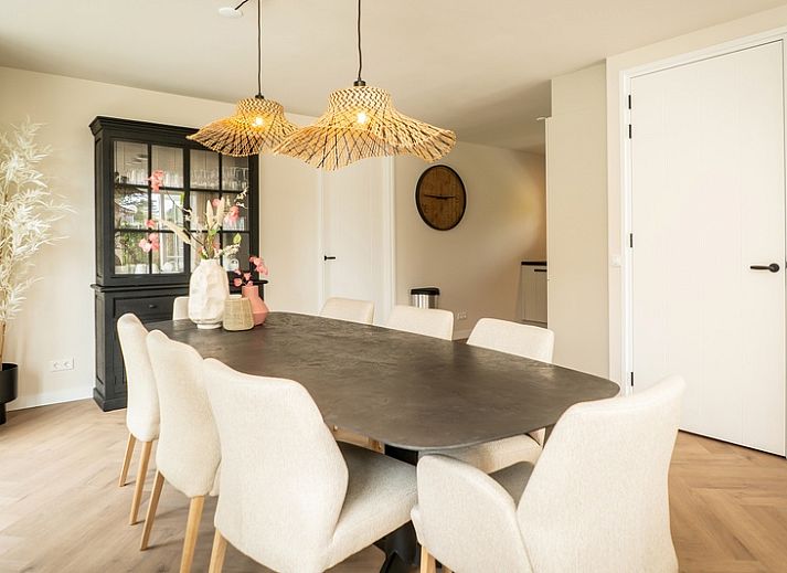 Vakantiehuis Villa 25a, De Koog, Texel met terras en groene omgeving op de Waddeneilanden.